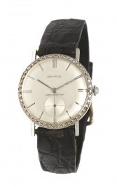 A 14 Karat White Gold and Diam