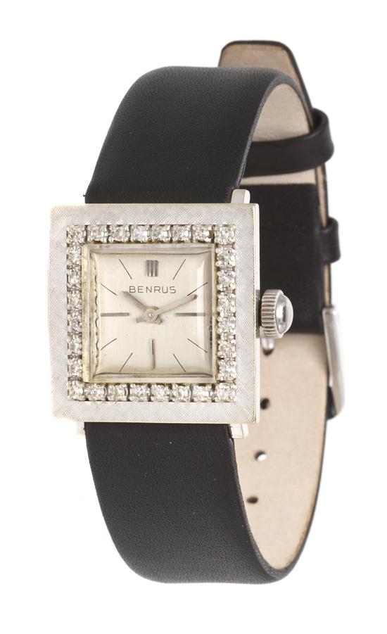 A 14 Karat White Gold and Diamond