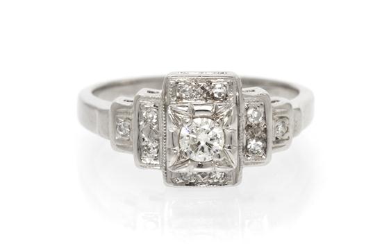 A 14 Karat White Gold and Diamond