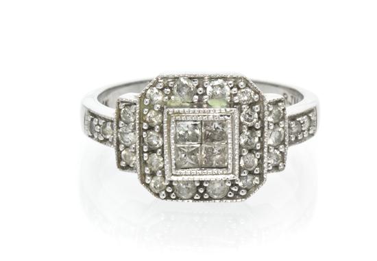 A 14 Karat White Gold Diamond