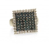 A 14 Karat White Gold and Diam