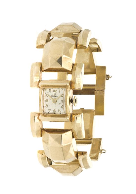 * A 14 Karat Yellow Gold Wristwatch