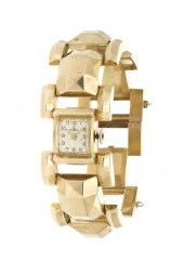 * A 14 Karat Yellow Gold Wrist