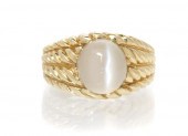 * A 14 Karat Yellow Gold and C