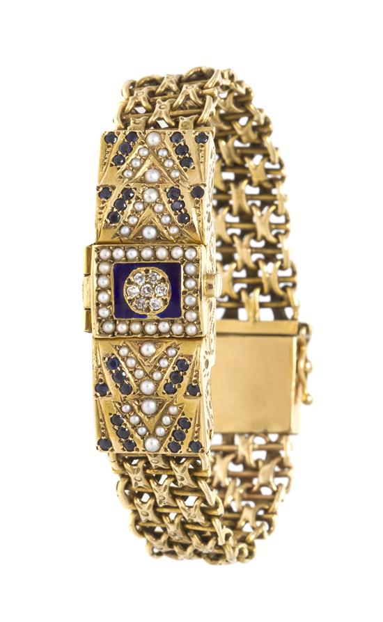 * A 14 Karat Yellow Gold Pearl