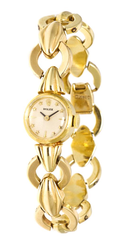 *A 14 Karat Yellow Gold
