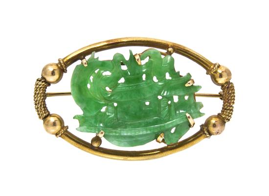*A 14 Karat Yellow Gold and Jade