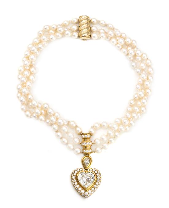 *A 14 Karat Yellow Gold Diamond and