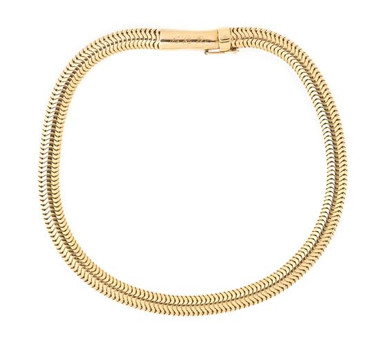 A 14 Karat Yellow Gold Snake