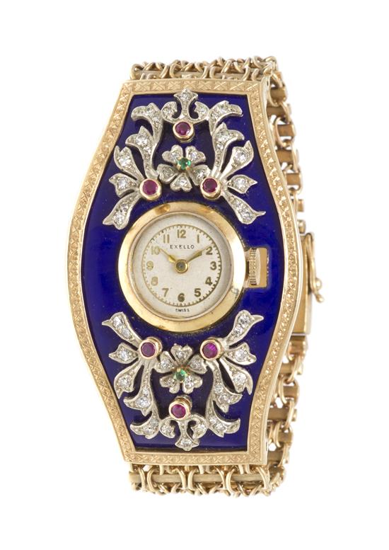 *A 14 Karat Yellow Gold Enamel Ruby