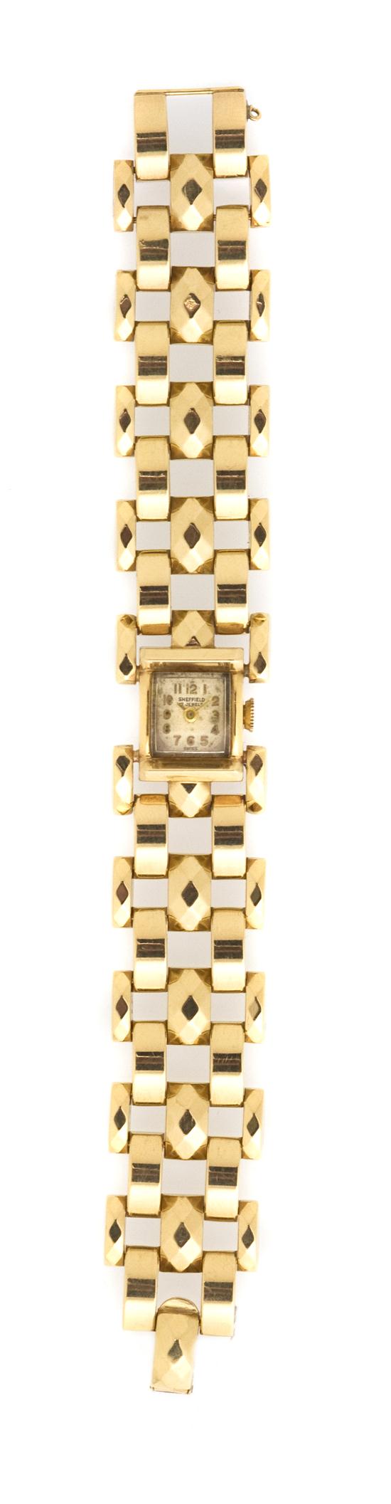 A 14 Karat Yellow Gold Mechanical