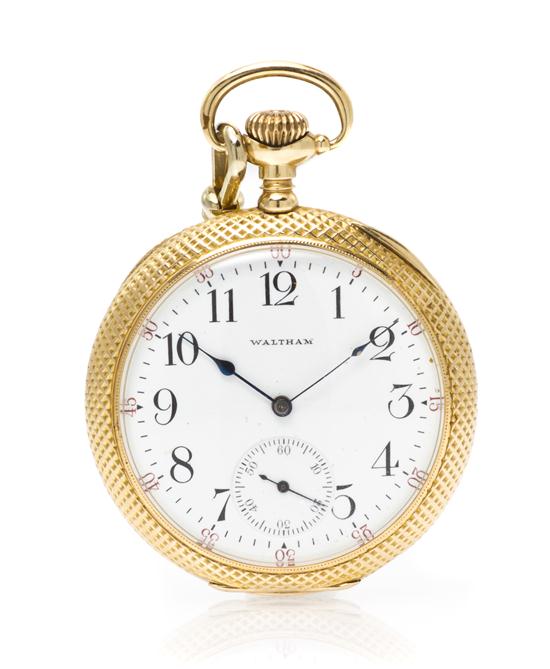 A 14 Karat Yellow Gold Open Face