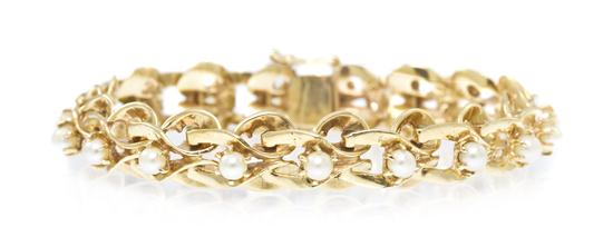 A 14 Karat Yellow Gold and Cultured