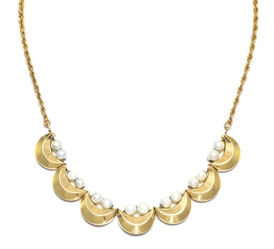 A 14 Karat Yellow Gold and Cultured