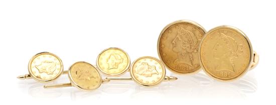A 14 Karat Yellow Gold and US
