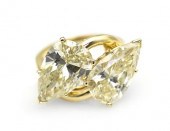 A 14 Karat Yellow Gold and Dia