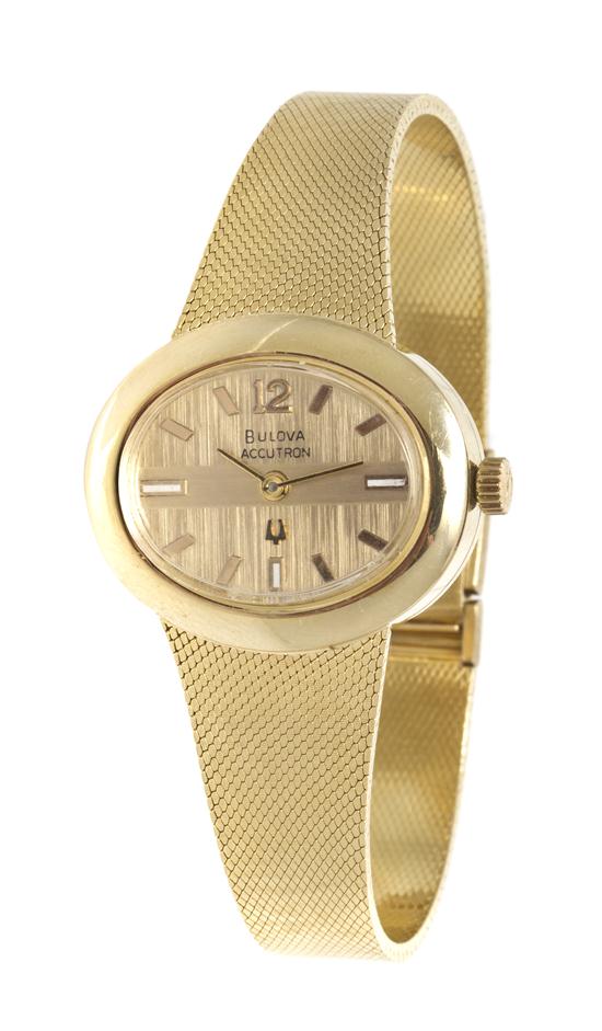 A 14 Karat Yellow Gold Accutron