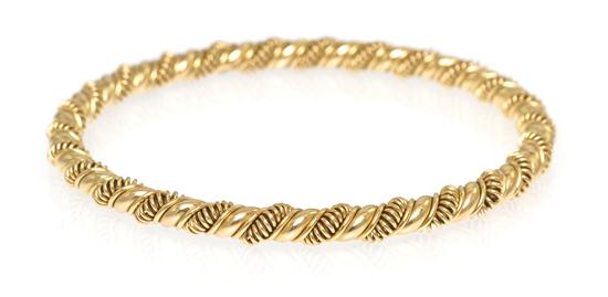 *A 14 Karat Yellow Gold Textured