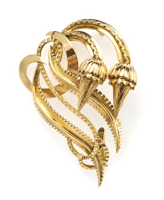 A 14 Karat Yellow Gold Brooch in