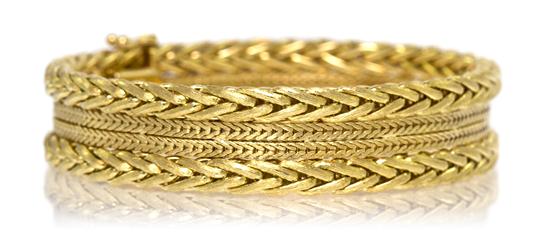 *A 14 Karat Yellow Gold Woven