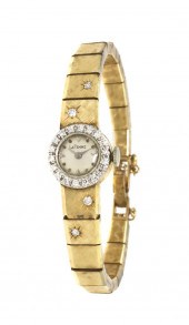 A 14 Karat Yellow Gold and Dia