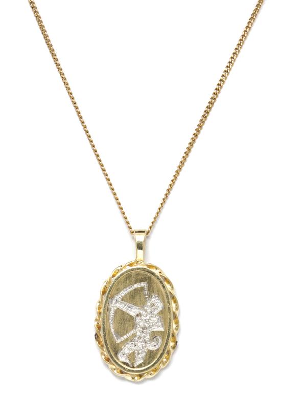A 14 Karat Yellow Gold and