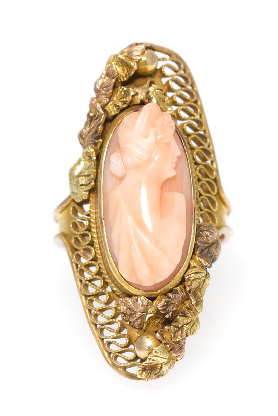 A 14 Karat Yellow Gold and Coral