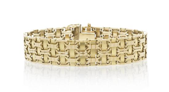 A 14 Karat Yellow Gold Textured