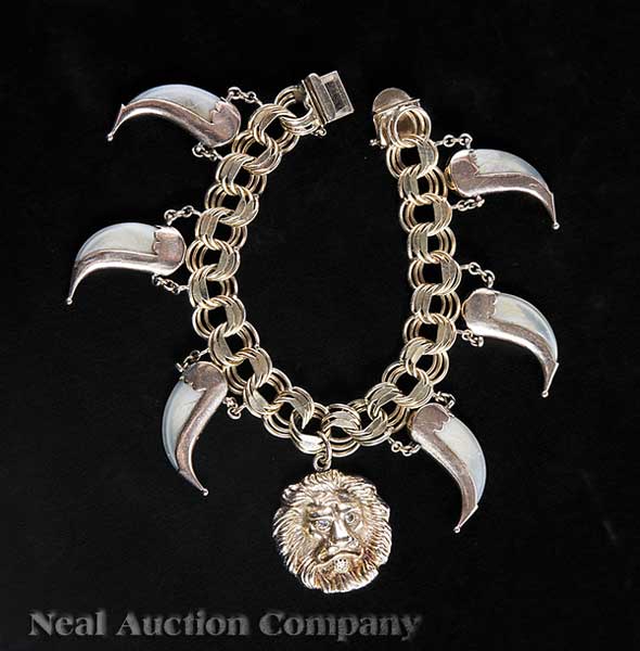 A 14 kt. Yellow Gold Charm Bracelet