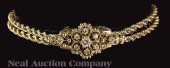 A 14 kt. Yellow Gold and Diamo