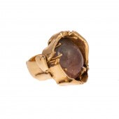 A 14K FREEFORM CABOCHON TOURMA