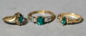 A 14k gold ring with an oval c