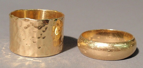 A 14k gold wedding band and a