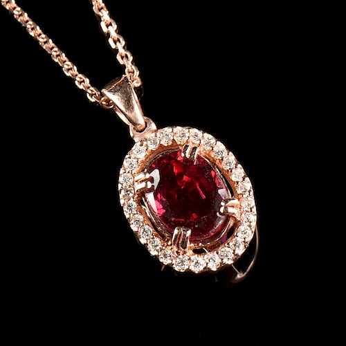 A 14K ROSE GOLD, RUBY, AND
