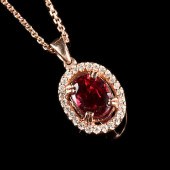 A 14K ROSE GOLD, RUBY, AND DIA
