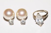 A 14K SIMULATED DIAMOND RING &