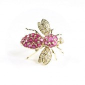 A 14K YELLOW GOLD AND RUBY BUM