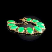 A 14K YELLOW GOLD AND CHINESE