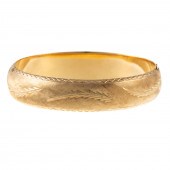 A 14K YELLOW GOLD FLORENTINE F