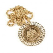 A 14K YELLOW GOLD MEXICAN 50 P