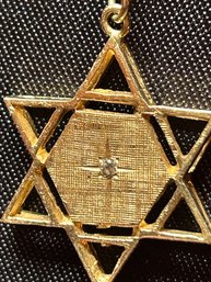 A 14k yellow gold Star of David