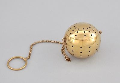 A 14K Yellow Gold Tea Ball The