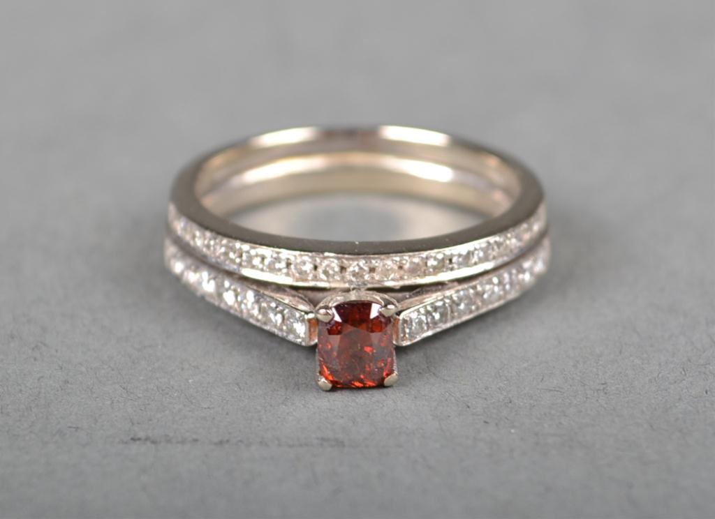 A 14kt White Gold And Red Diamond