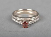 A 14kt White Gold And Red Diam