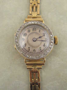 A 15 ct gold lady's wrist watch