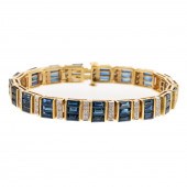 A 15.00 CTW SAPPHIRE & DIAMOND