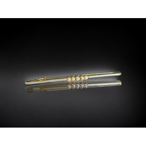 A 15ct gold & Platinum bar