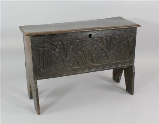 A 17th century carved oak six plank