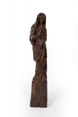 A 17th Century limewood figure of