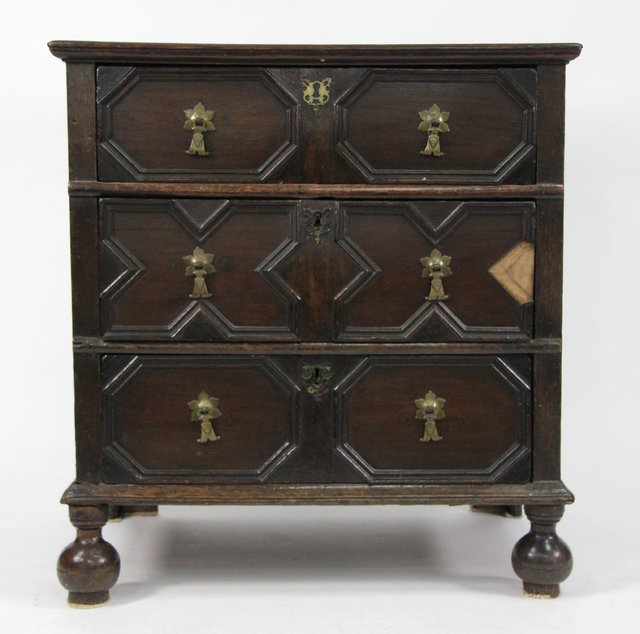 A 17th Century oak chest fitted